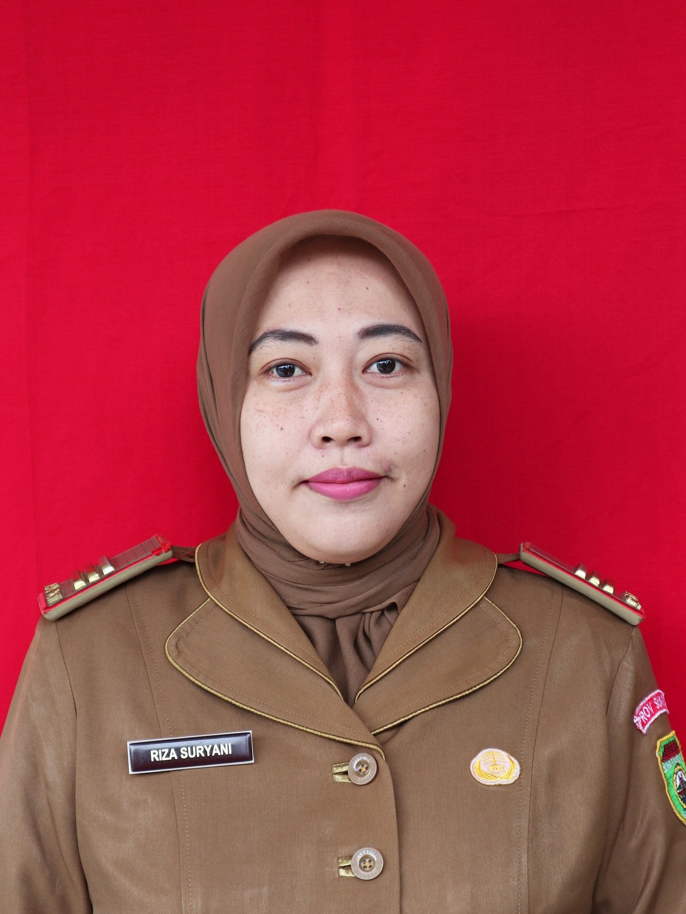 Riza Suryani, M.Pd